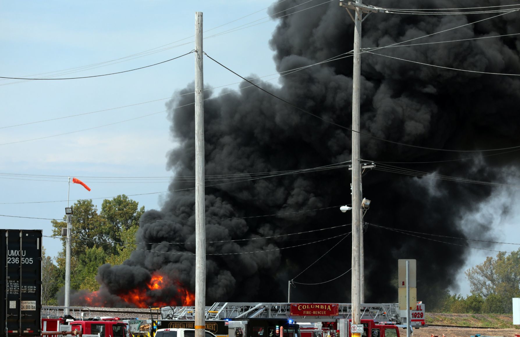 Derailed train cars catch fire in Dupo